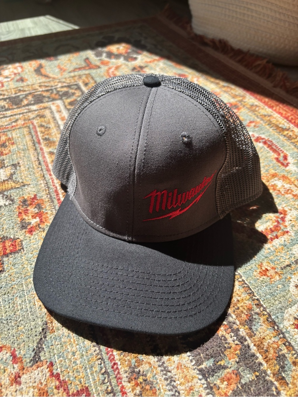 Milwaukee Gray and Black Trucker Hat with Red Logo